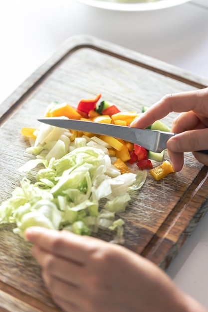 Hands preparing meal